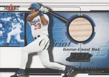 2001 Fleer Triple Crown - Feel the Game #NNO Eric Karros Front