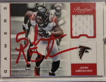 2012 Panini Prestige - Gamers Materials #32 John Abraham Front