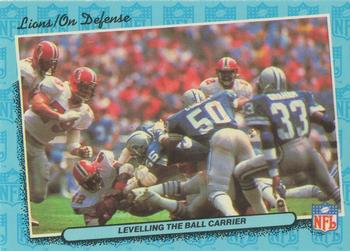 1986 Fleer Team Action #23 Leveling the Ball Carrier Front