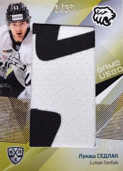 2021-22 Sereal KHL One World One Game Platinum Collection - Game-Used Jersey Logo Patch #PAT-005 Lukas Sedlak Front