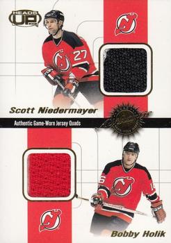 2001-02 Pacific Heads Up - Quad Jerseys #3 Scott Niedermayer / Bobby Holik / P.J. Axelsson / Don Sweeney Front