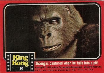 1976 Topps King Kong #30 Kong is captured when he falls into a pit! Front