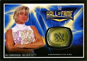 2016 Topps WWE Road to Wrestlemania - WWE Hall of Fame Commemorative Ring Relic #NNO Alundra Blayze Front